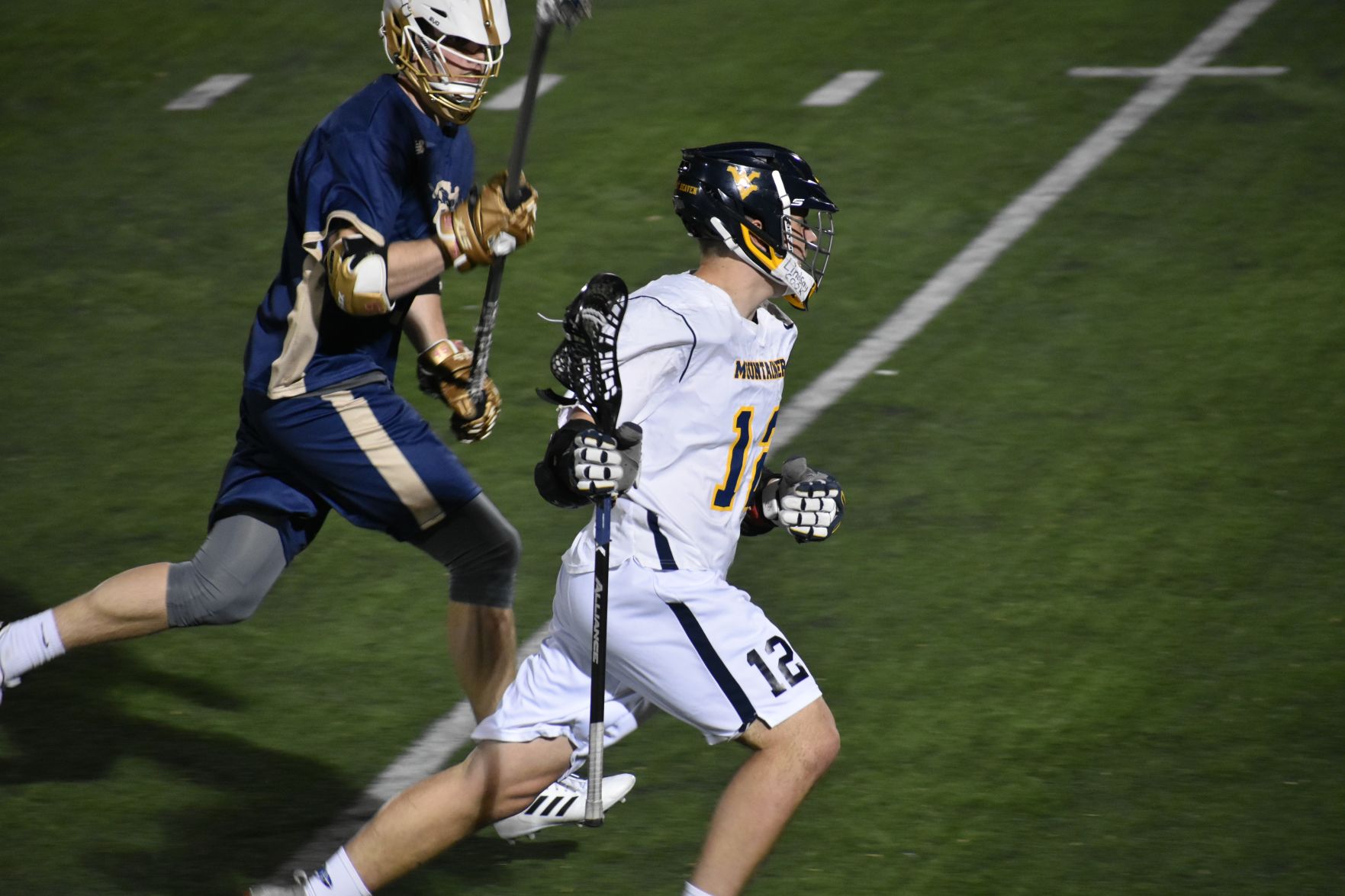 Former midfielder Nick Kyak pursues the goal during a lacrosse game last year.